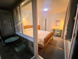 Room In flat is 1st door past carport - 9