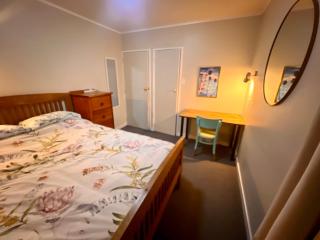 Room In flat is 1st door past carport - 2