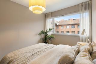 Modern and centrally located apartment with 2 bedrooms and a garage space with EV charger - 9