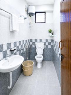 SLS Homestay - Luxury AC Service Apartments 1BHK, 2BHK, 3BHK - Direct Flyover to Alipiri Tirumala Gate - Walk to PS4 Pure Veg Restaurants, Supermarkets - Near to National Highway & Padmavathi Amma Temple - Modular Kitchen, Living room -Free Superfast Wifi - 1