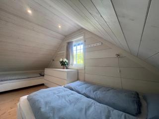 Idyllic cabin on the waterfront with boat rental - 1