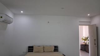 Spacious bedroom with a patio attached - 5
