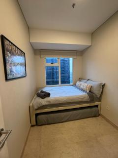 Podomoro Delipark Apartemen Cozystay Lincoln Tower 2BR Medan - 1