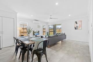 Fresh and Stylish 4BR Getaway Near Local Parklands - 1