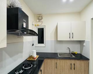 Second Home Faisalabad Luxury Apartment with Kitchen WiFi Parking & Self Check-in - 4