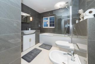 Spacious 4BR Home with Games Room Free Parking - 6