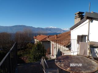 Romantic Attic Retreat with Panoramic Terrace, Steps from the Lake - 8