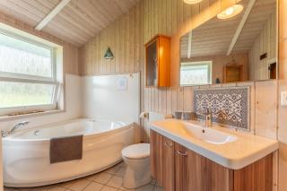 12 Personen Familienferienhaus mit Sauna, Whirlpool, zwei Duschen und Toiletten, Kaminofen und Kanu in 1. Reihe zum See mit wundervollem Seeblick in Otterndorf - 7