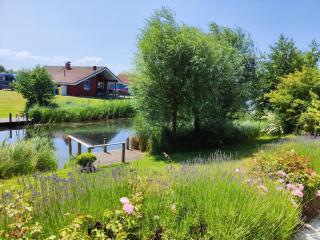 6 Personen Ferienhaus mit privatem Bootsteg, direkter Seelage, Kanu, Sauna und Badewanne in Otterndorf - 8