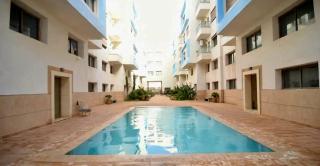 sunny amazigh apt avec piscine pool steps from beach 2balcony 2smartTV pool - 7