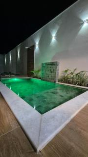Casa Sol com piscina e 2 suítes com ar condicionado, pertinho da praia - 0