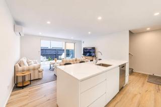 Modern Two Storey Stay with Private Patio - 1