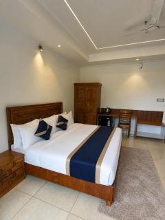 The Grand Indra Resort # Central Heated & Air Cooled # Lift # Parking # Restaurant # Rooftop # Dharamshala - 3