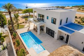 Sunset Cove Brand-New Luxury Oceanfront Villa with Panoramic Caribbean Views - 0