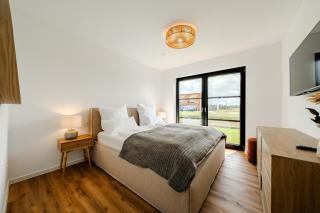 Küsten Suites Hildes Huuske - direkte Wasserlage, Terrasse, 117qm, Neubaugebiet - 2