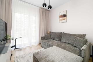 Functional Apartment with a Balcony and Parking Close to Green Spaces by Noclegi Renters - 6