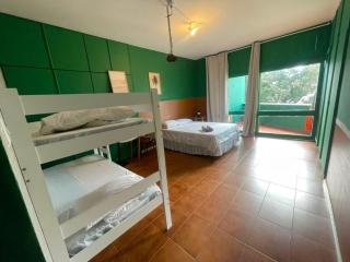 Cama em Suíte com varanda privada a 160 mts da Praia 4 - 0