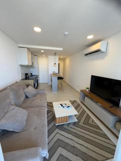 Bello y Cómodo Apartamento con Vista a la Playa en Edificio Vivo Costanera con Parking - 9