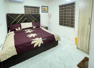 Optizee Hotel and Suites - 6