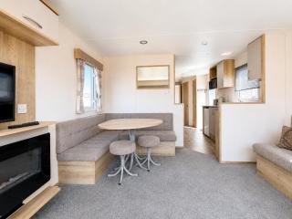 Homely caravan with side decking at Pakefield Holiday Park, Suffolk ref 68071CR - 1