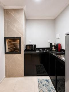 Apartamento Elegante com Varanda e Vista para o Mar em Frente ao Centro de Convenções - 1