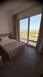 Sea-view family apartment with 3BR Opposite Rixos premium Alamein By Gadora - 1