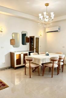 Sea-view family apartment with 3BR Opposite Rixos premium Alamein By Gadora - 5