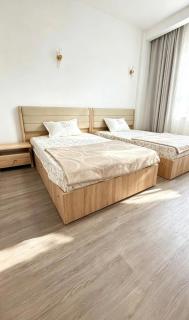 Sea-view family apartment with 3BR Opposite Rixos premium Alamein By Gadora - 8