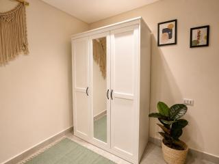Modern 1BR Apartment Garden View - 9