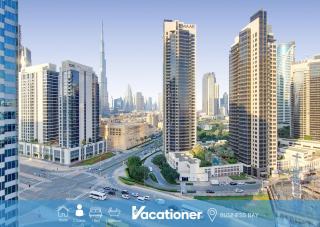Vacationer Holiday Homes l Bright Studio l Burj Khalifa View l Business Bay - 0