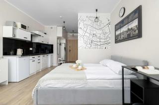 Funkcjonalne Apartamenty z Klimatyzacją i Miejscem do Pracy by Noclegi Renters - 1