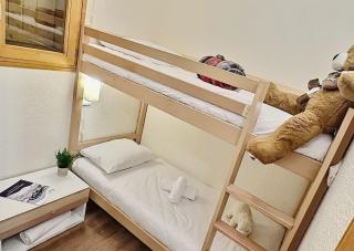 Résidence Divaria - Studio cabine 4 personnes à Tignes au pied des pistes et proche des commerces dans le quartier du Lac. Situé en rez de jardin d' MAE-2114 - 2