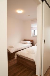 Apartment mit 2 Schlafzimmern Business-Apartment 02 2-Zimmer mit Kochgelegenheit und Parkplatz - 4