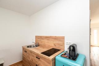 Apartment mit 2 Schlafzimmern Business-Apartment 02 2-Zimmer mit Kochgelegenheit und Parkplatz - 2