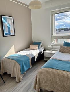 2ndhomes Cozy Central 2BR Apartment Sauna Balcony Parking - 5