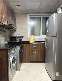Entire 1-Bedroom Apartment in Oasis Tower, Ajman - 2