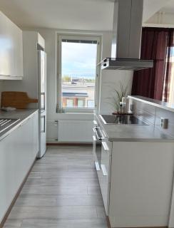 2ndhomes Cozy Central 2BR Apartment Sauna Balcony Parking - 1