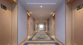 Vienna Hotel Weihai High-Speed Railway Station Huaxiacheng See Park - Weihai - 1