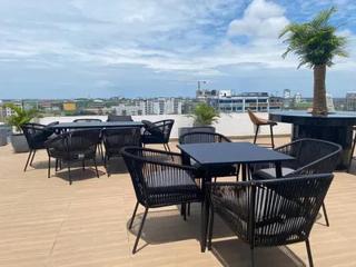 Charming 1BR with Rooftop Pool & Stunning City Views - 7