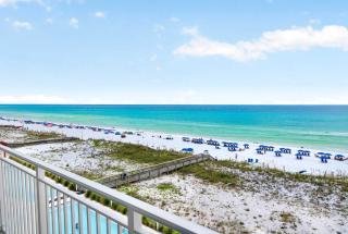 Luxurious gulf front condo with private balcony shared pool & beach access - 0