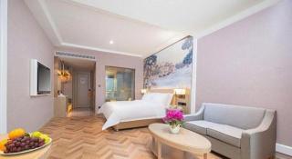 Vienna Hotel Lincang New Asia Pacific Times Square - 3
