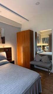 Condo Traveler's Nest 211, Amani Resorts Residences, 5 minutes Airport, Netflix, Stylish, Cozy with Luxurious Swimming Pool - 5