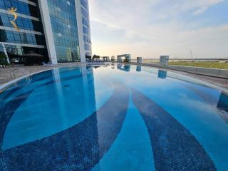 Sleek King Studio - Chic Modern Pool View Haven - 6
