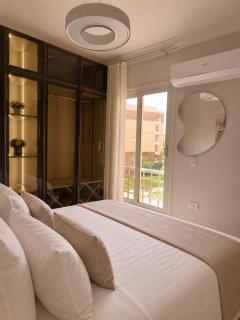 Bright 2-Bedroom Garden View Retreat in Madinaty, New Cairo, By Kemetland - 7