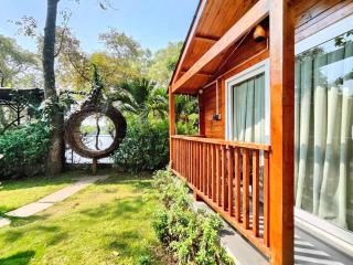 Tranquill Riverside Luxury Cottages - 1
