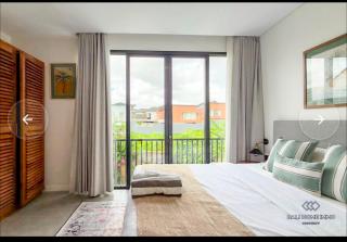 Peaceful 2BR Modern Oasis in Tumbak Bayuh - 1