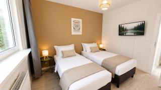 Apartment für Berufstätige mit 5 Einzelbetten, Smart TV, Küche, WIFI, Balkon, WaMa - 1