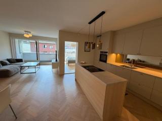 Modern and centrally located apartment with 2 bedrooms and a garage space with EV charger - 8