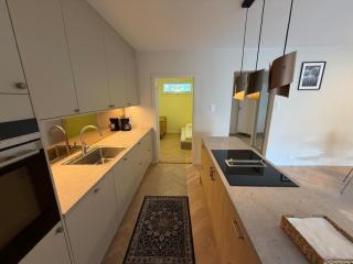 Modern and centrally located apartment with 2 bedrooms and a garage space with EV charger - 7