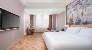 Vienna Hotel Lincang New Asia Pacific Times Square - 1